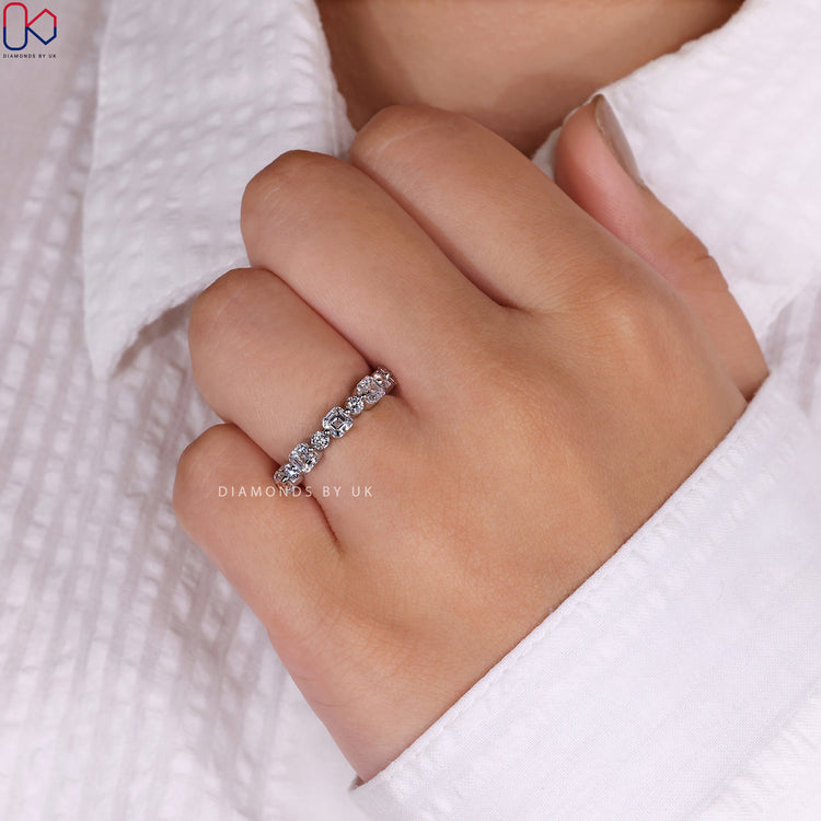 Prong set wedding band showcasing secure and dazzling diamonds.
