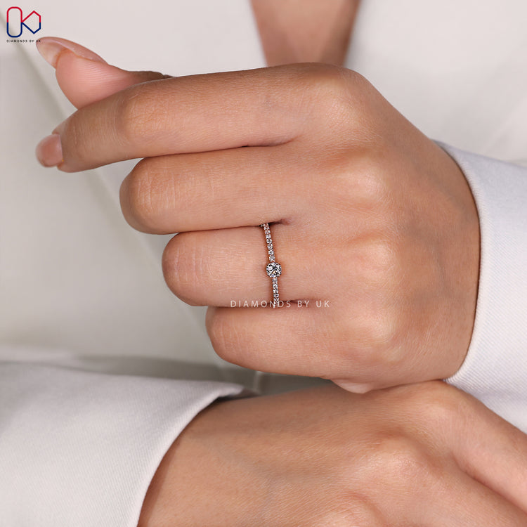 Pave setting ring featuring a double claw prong for added security and sparkle.

