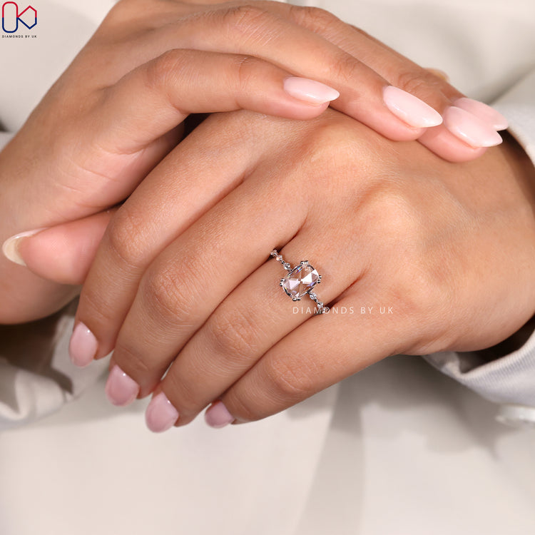 Prong Setting Cushion Cut Diamond Ring with round side diamonds, perfect for an elegant and timeless engagement.
