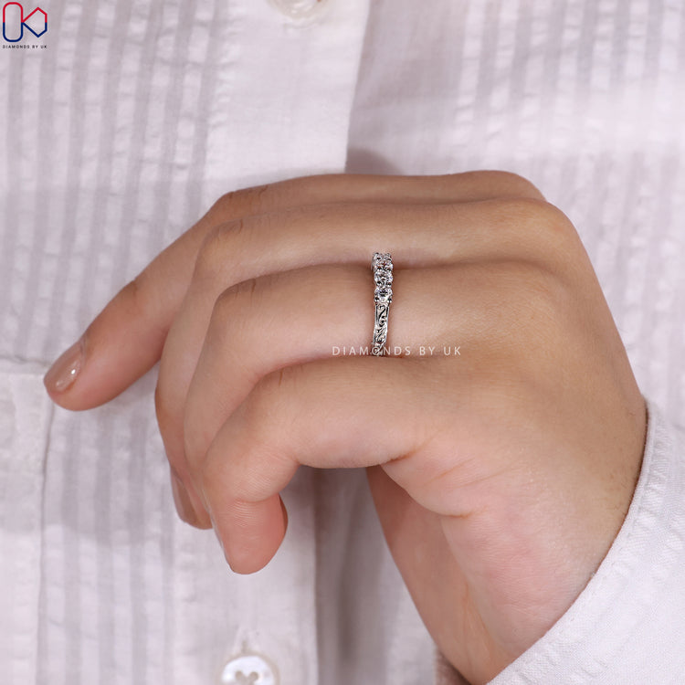 Polished white gold wedding band with a sleek and modern finish.