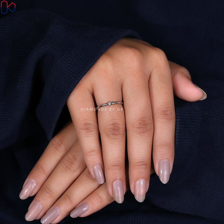 Handmade jewellery featuring a stunning round diamond wedding band
