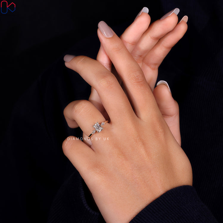 Lab Grown Diamond centre stone in a 3 stone engagement ring with marquise side stones.
