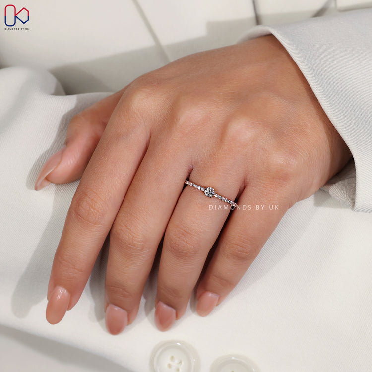 Handmade ring with a brilliant pave setting ring and secure double claw prong.
