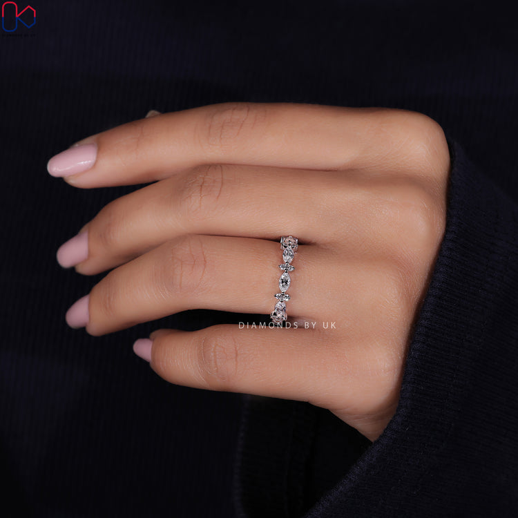 Round and marquise diamond wedding band with a timeless elegance.
