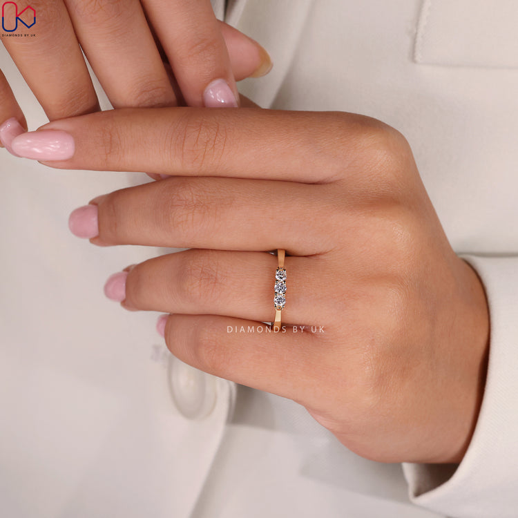 Diamondsbyuk wedding band with lab grown round diamonds.
