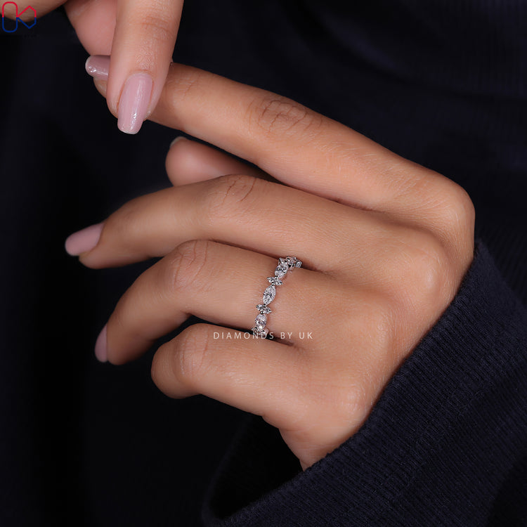 IGI certified wedding band with marquise and round diamonds.
