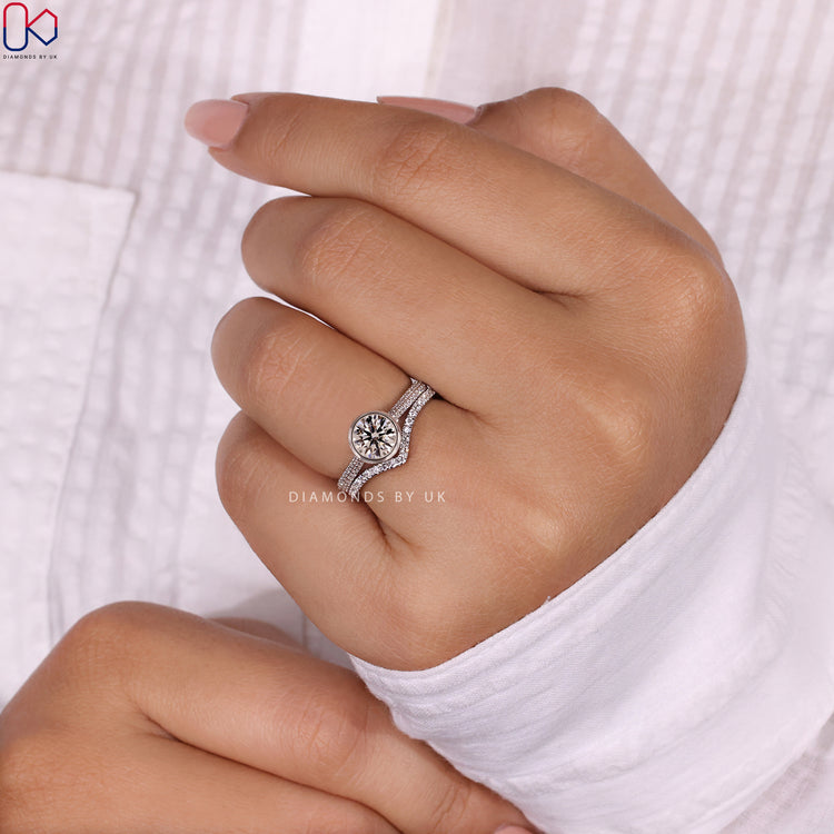 Round diamond bridal set with lab grown diamonds for a stunning appeal.
