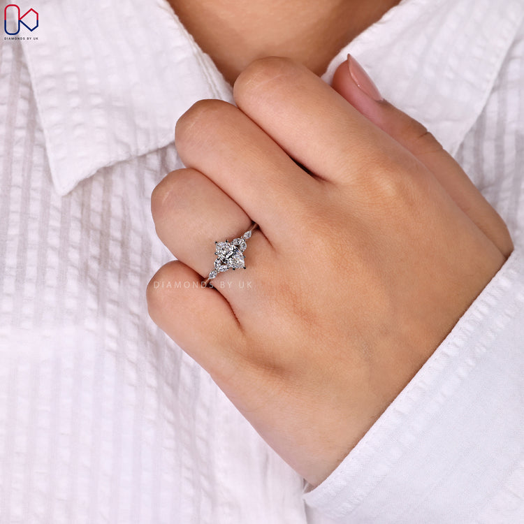 Six prong claw marquise cut engagement ring.
