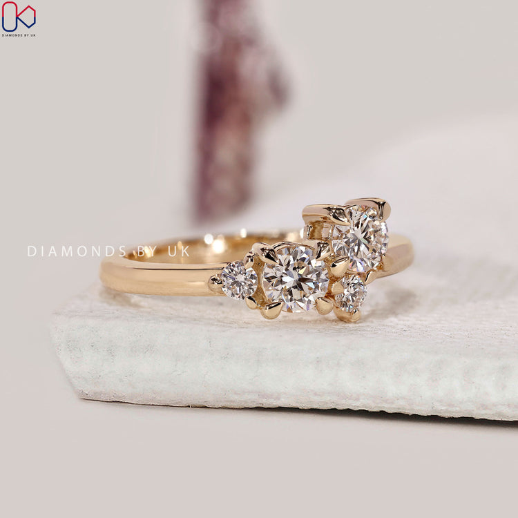 Claw prong setting ring featuring round lab grown diamonds.
