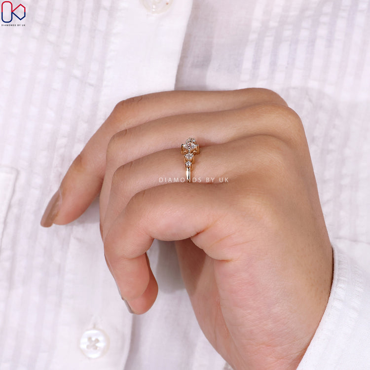 Prong setting engagement ring with diamonds.
