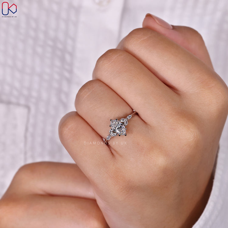 Marquise cut side stone diamond engagement ring.
