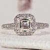 Asscher cut diamond ring with halo engagement ring.
