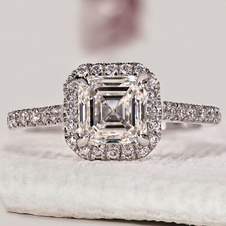 Asscher cut diamond ring with halo engagement ring.
