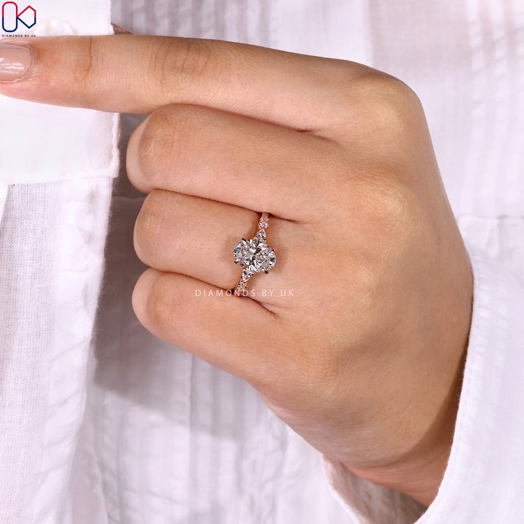 Handmade ring with oval center and 7 stone design.
