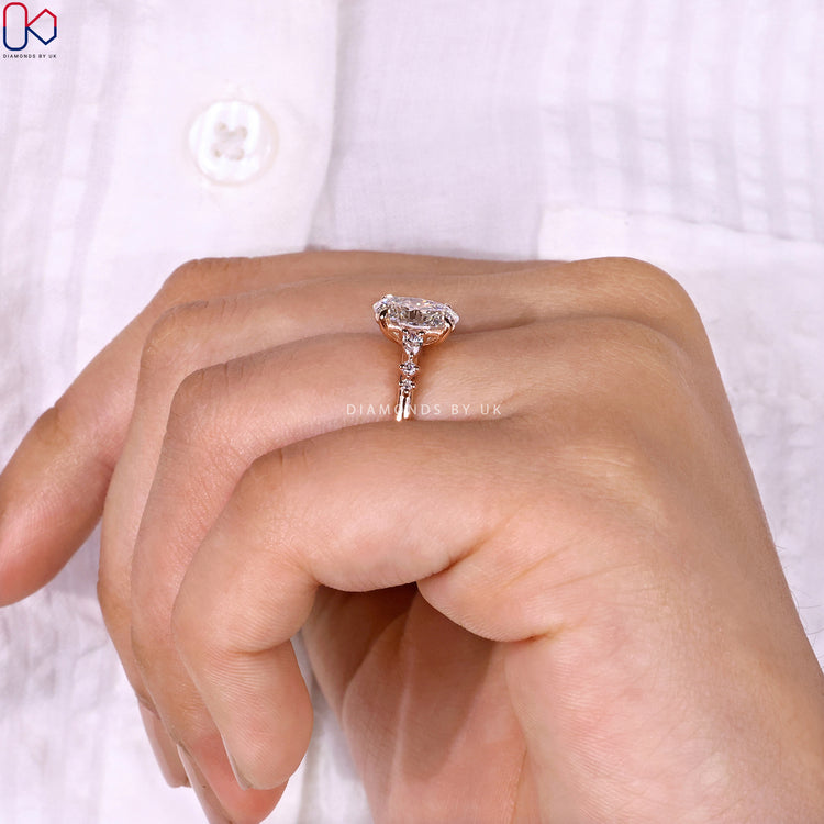 Handmade jewellery with rose gold and side stones.
