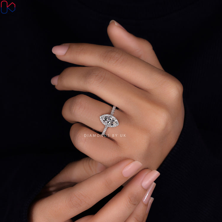 Handmade ring featuring a marquise diamond in a classic setting.
