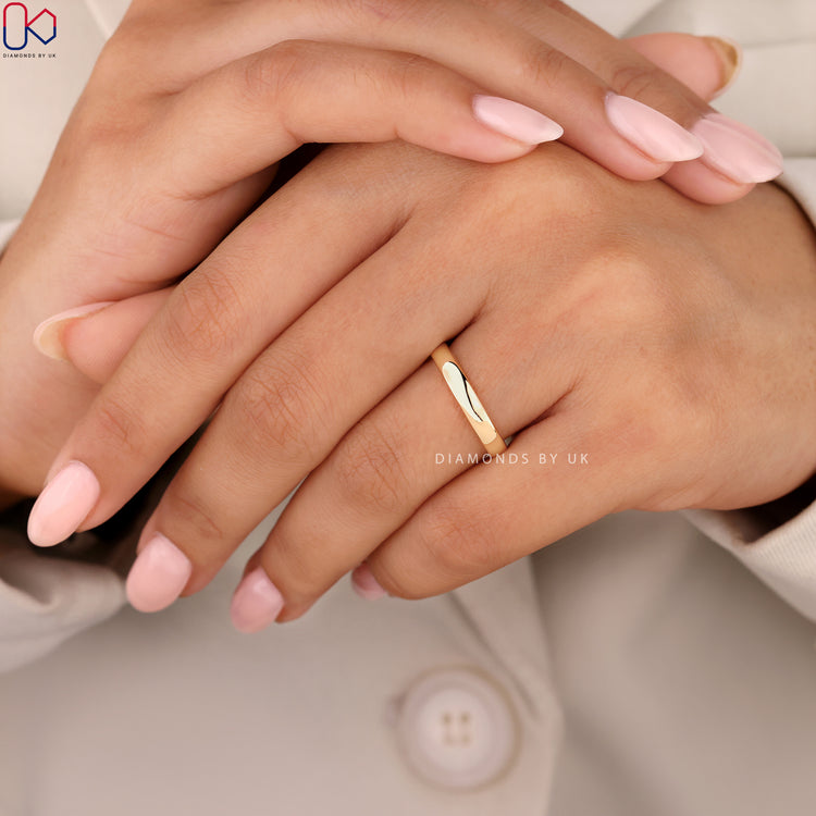 Buy wedding band in yellow gold wedding band style.
