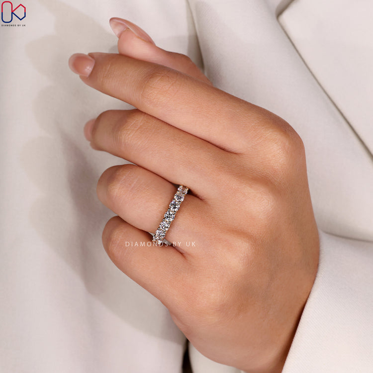 Yellow gold band for woman with full diamond eternity for a luxurious look.