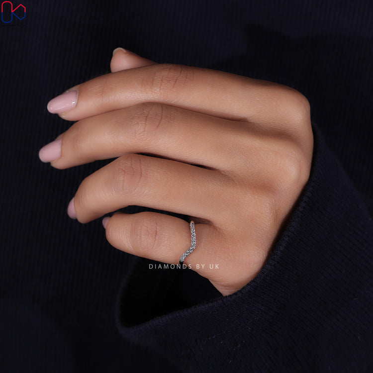 White gold wedding band showcasing a polished and refined finish.
