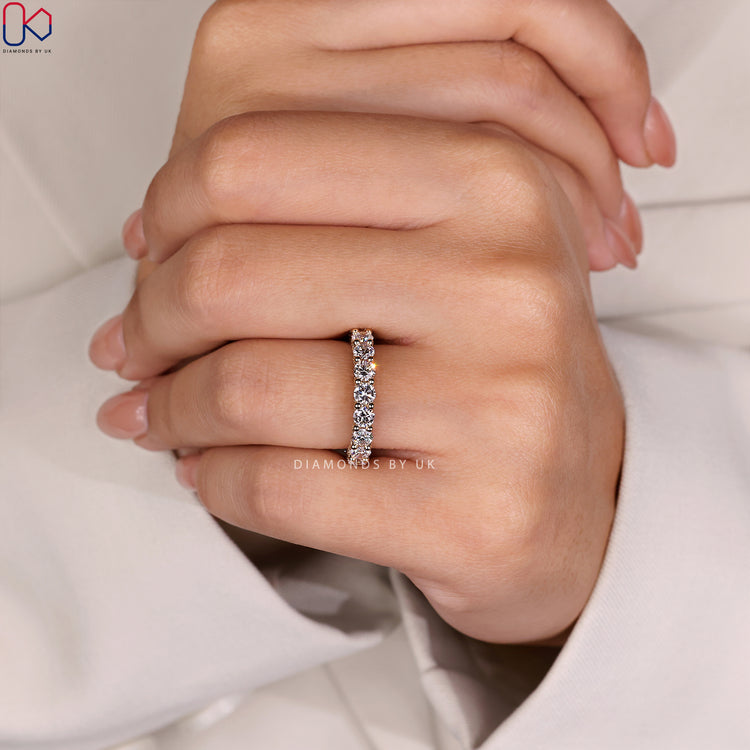 Minimalist wedding band with full diamond eternity for a subtle, modern style.