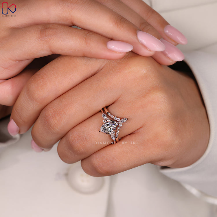 Rose gold bridal set with coordinated engagement and wedding rings.
