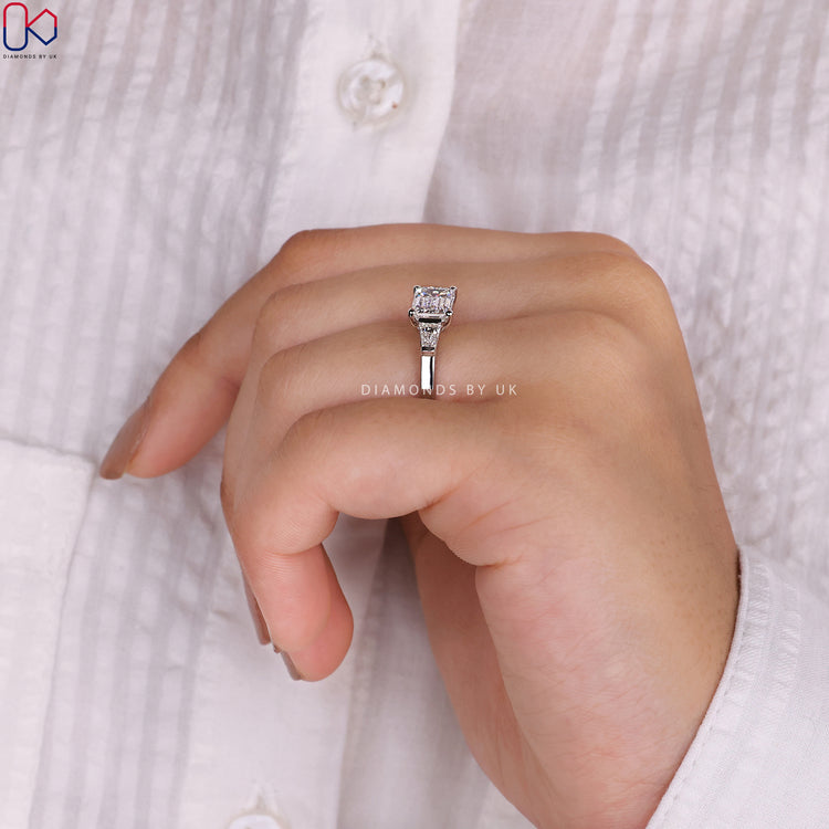 White gold diamond ring with a polished finish.
