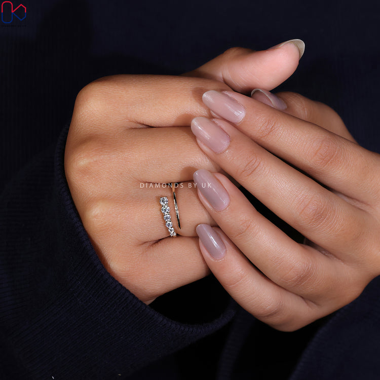 Yellow gold wedding band with intricate details for an elegant finish.
