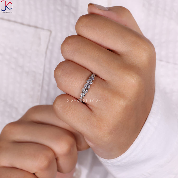 Half eternity wedding band showcasing sparkling diamonds in a classic style.