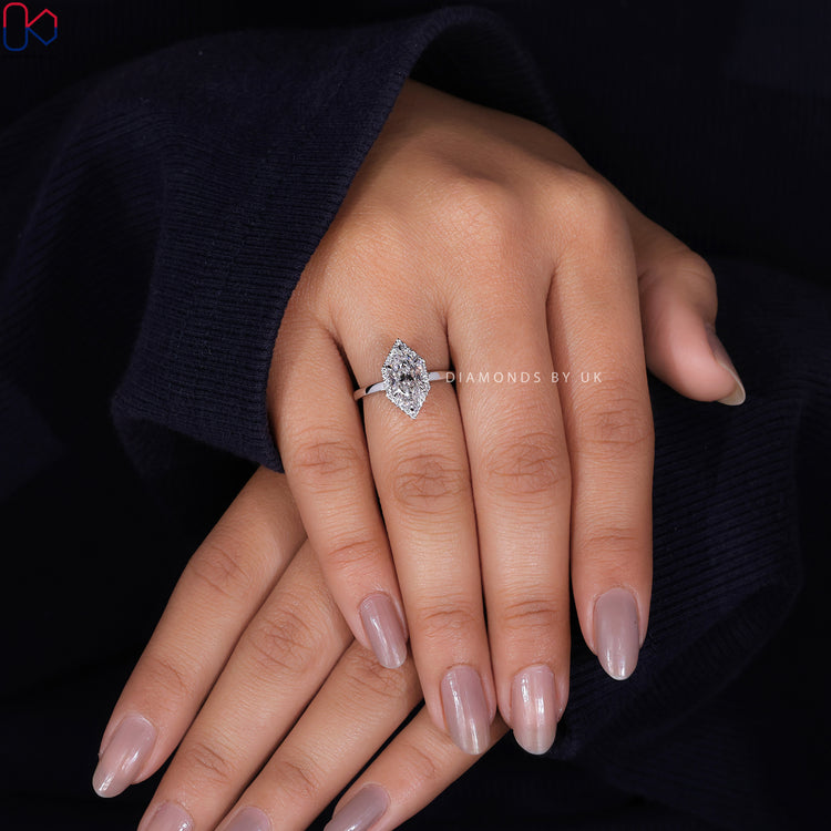 Handmade jewellery with a dazzling Dutch Marquise and halo diamond design.