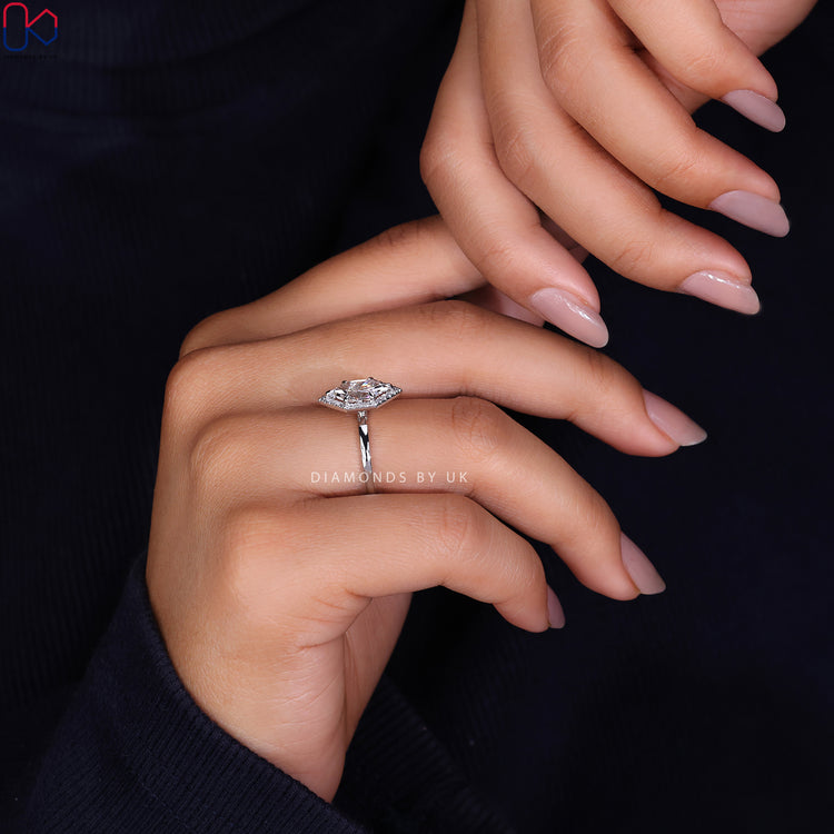 Shop to buy engagement ring featuring a Dutch Marquise and halo design.
