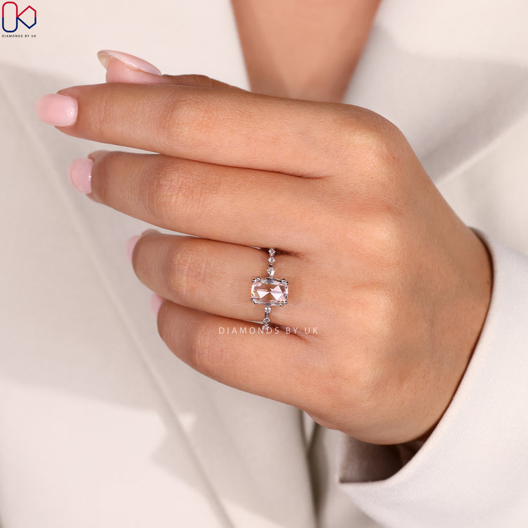 Round Side Diamond Ring with Cushion Cut Diamond, prong setting, and white gold band for a sophisticated design.
