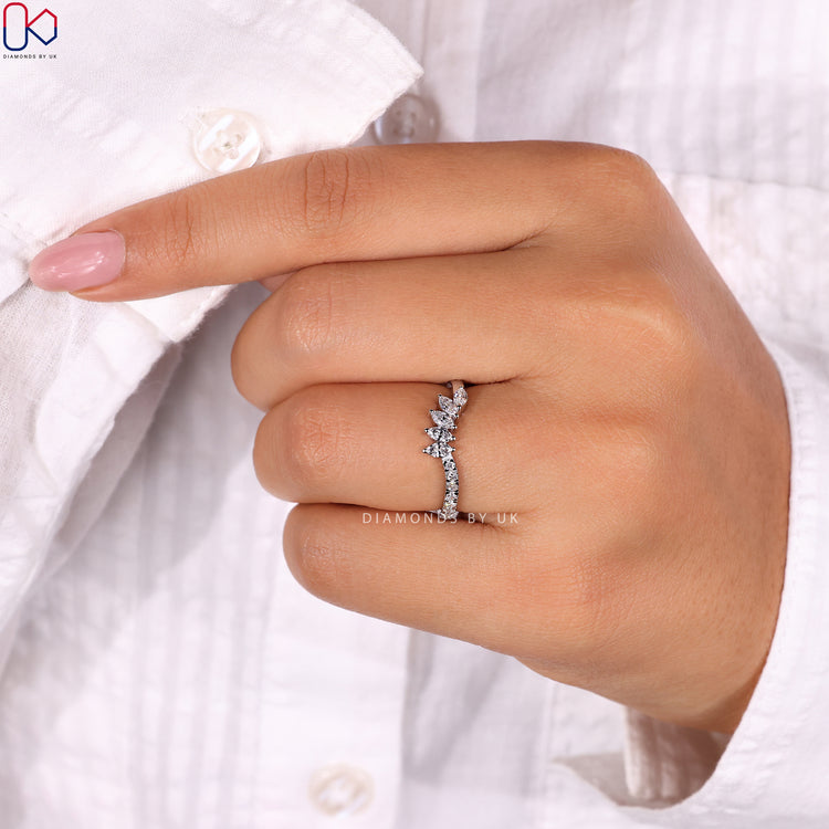 Handmade ring designed as a Tiara wedding band with marquise diamonds.
