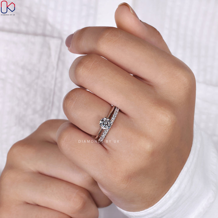 White gold bridal set featuring a sparkling lab-grown diamond.
