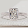 Radiant cut solitaire ring with bezel setting.