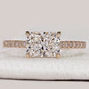 Radiant cut ring with east to west hidden halo style.