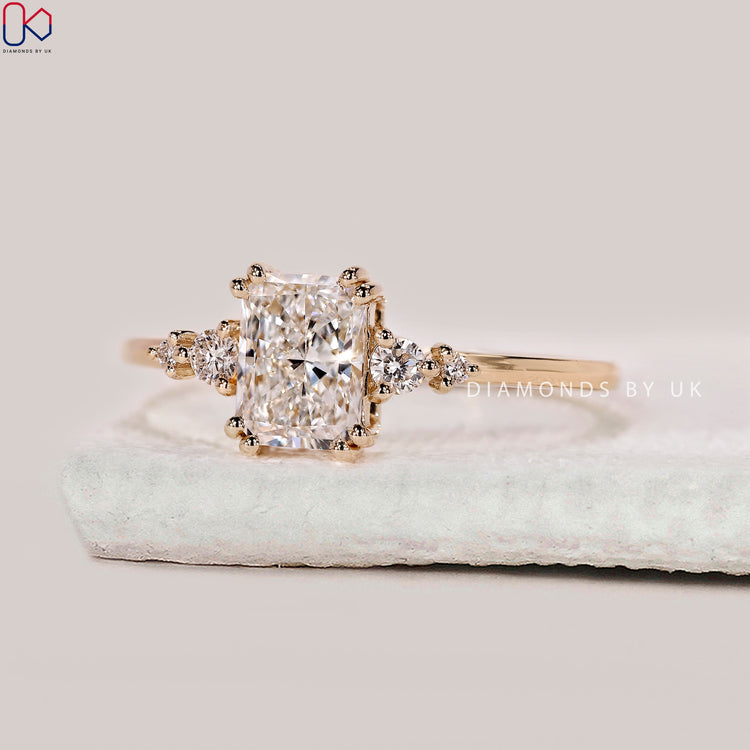 Radiant cut lab grown diamond five stone ring.