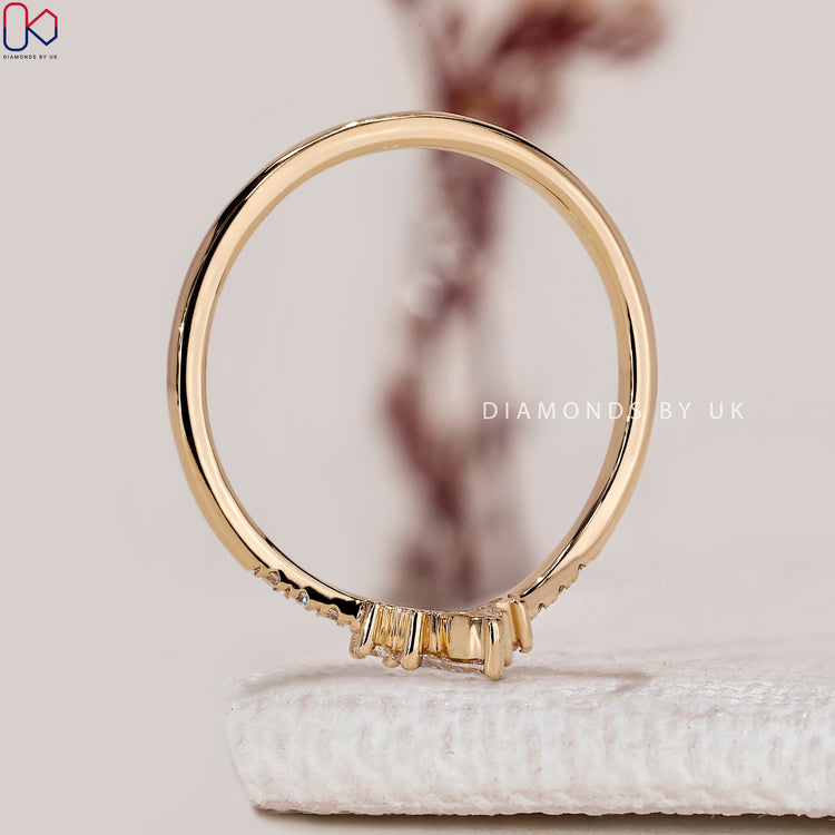 Handmade round and marquise diamond wedding band.
