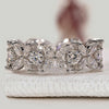 Round and marquise diamond wedding band floral style.