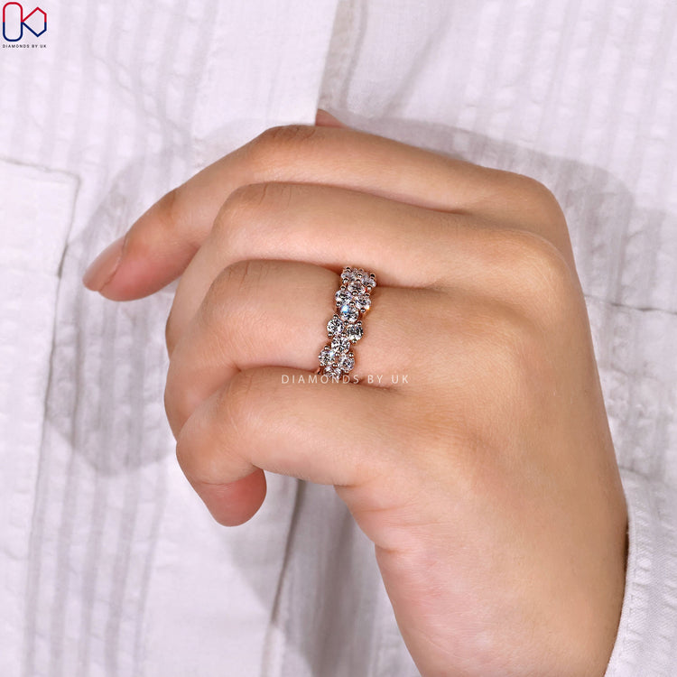 Round diamond band with clustered stones.