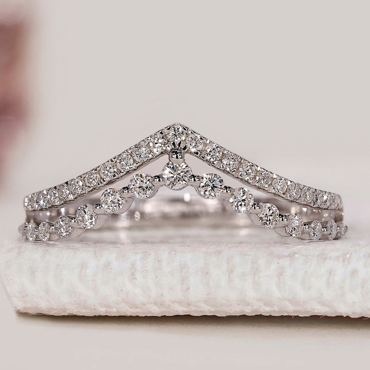 Round cut diamond band with double row chevron style.
