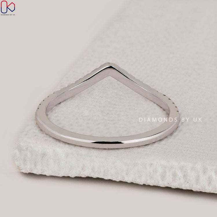 Round diamond half eternity wedding band made with handmade detail and precision.
