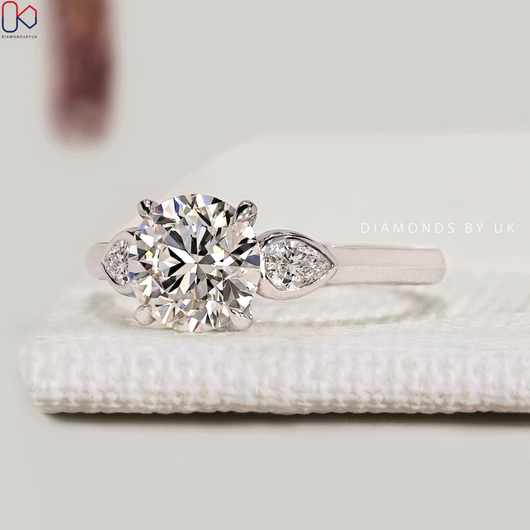 Lab grown round diamond ring with cathedral setting.
