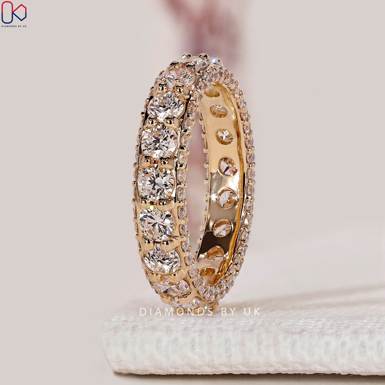 Round diamond wedding band with full eternity style.