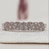 Round diamond band with half eternity style.