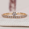 Round cut diamond band with eternity pavé style.
