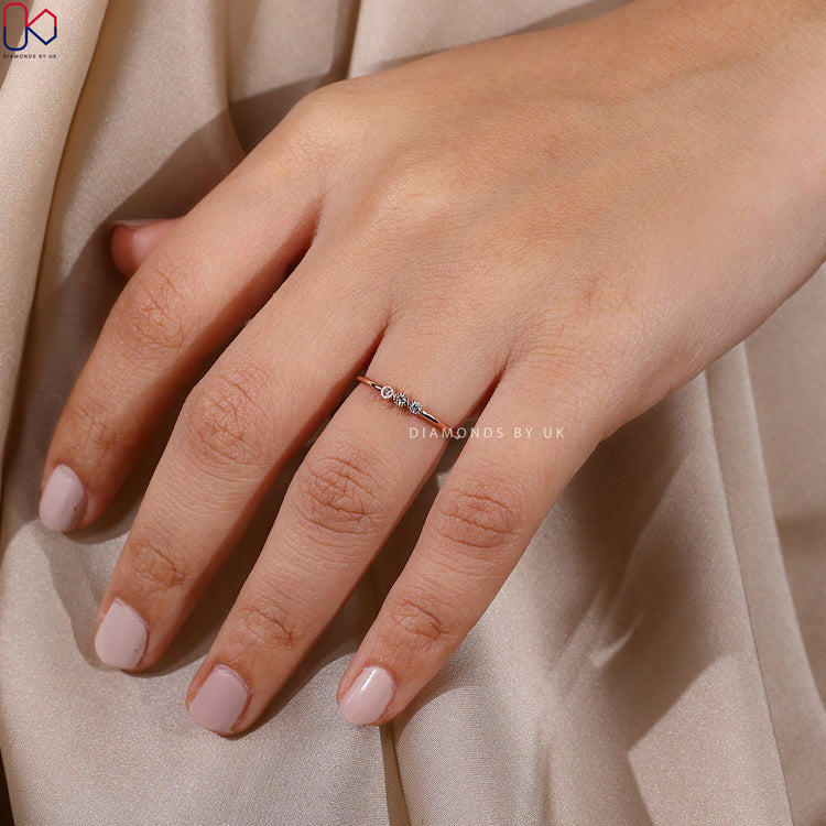 Diamondsbyuk round diamond band with milgrain setting.
