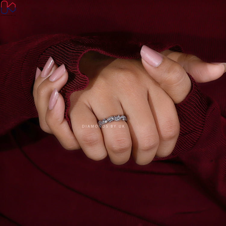 Lab grown diamond wedding band with twisted pavé style.