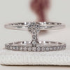 Round diamond wedding band with geometric ring style.