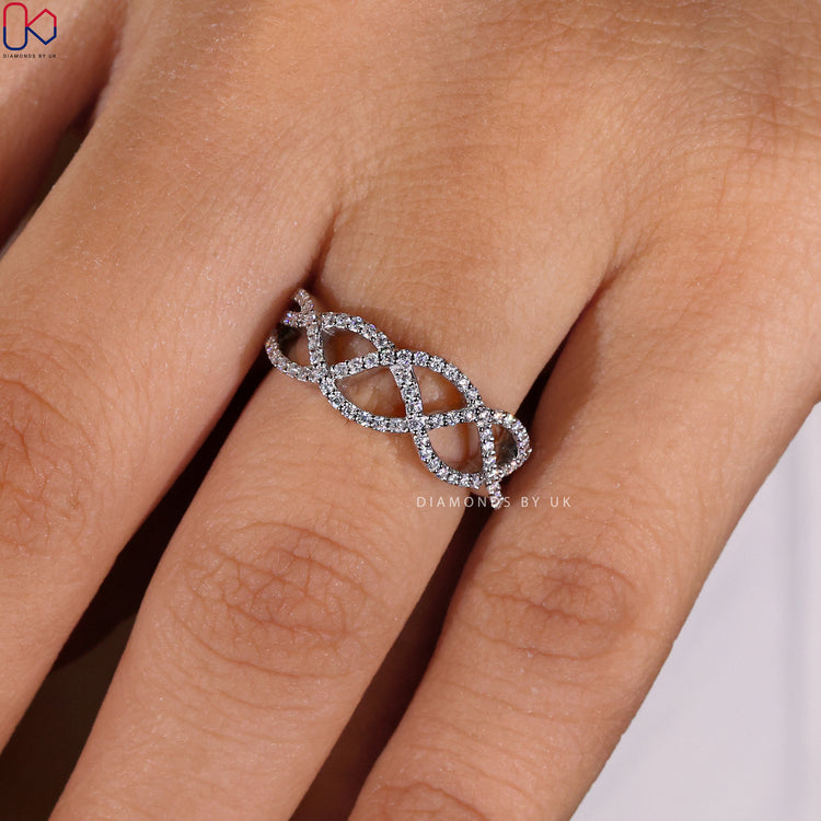 Handmade jewellery includes round cut diamond band and custom options.
