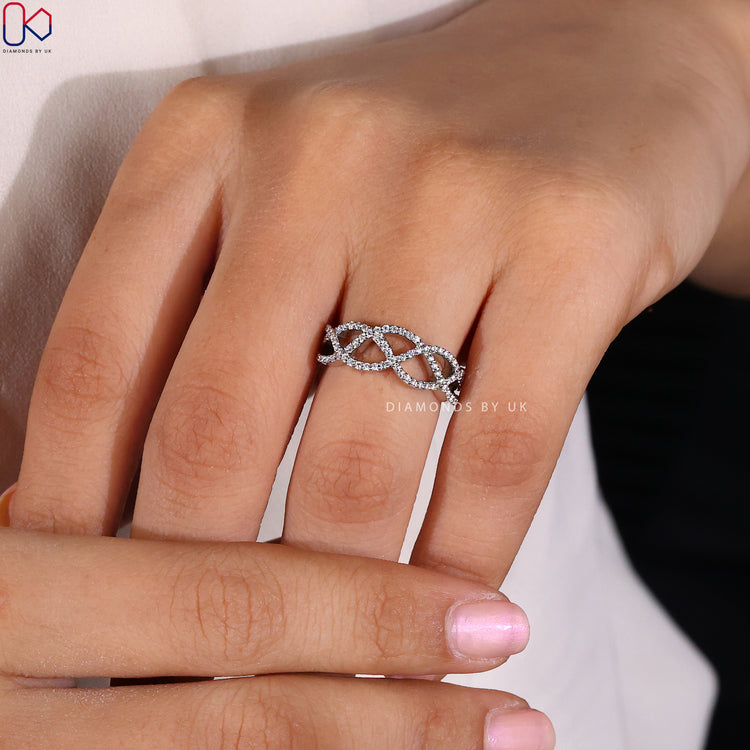 Buy diamond band crafted in wave wedding band style.
